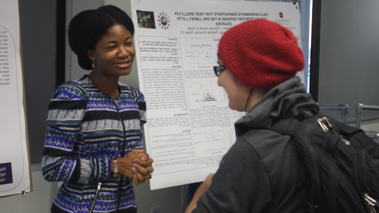 Chapman student explains research.