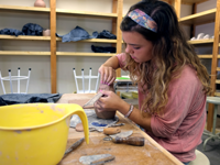 Student working clay